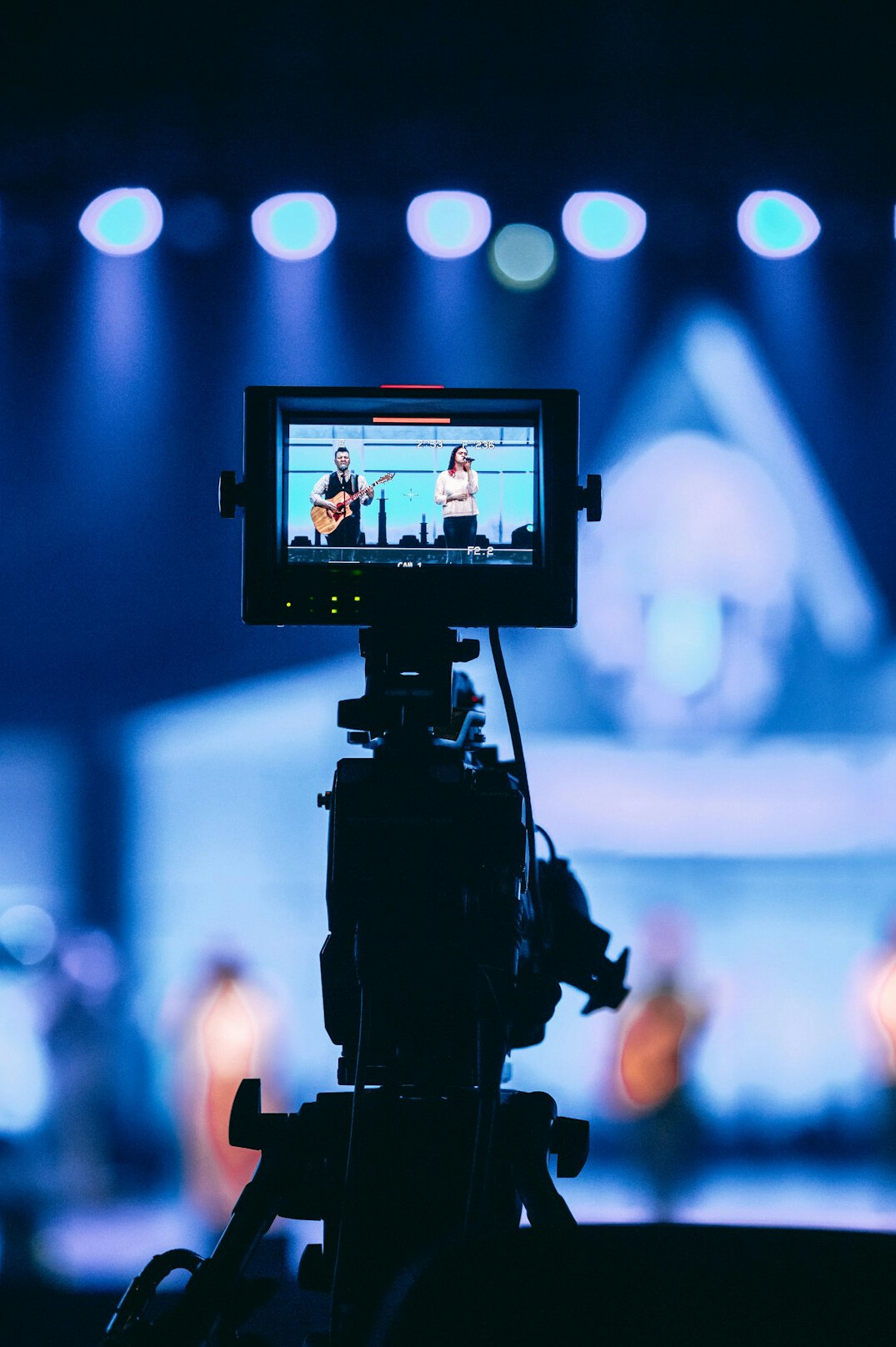 Television studio floor with cameras and lighting rigs